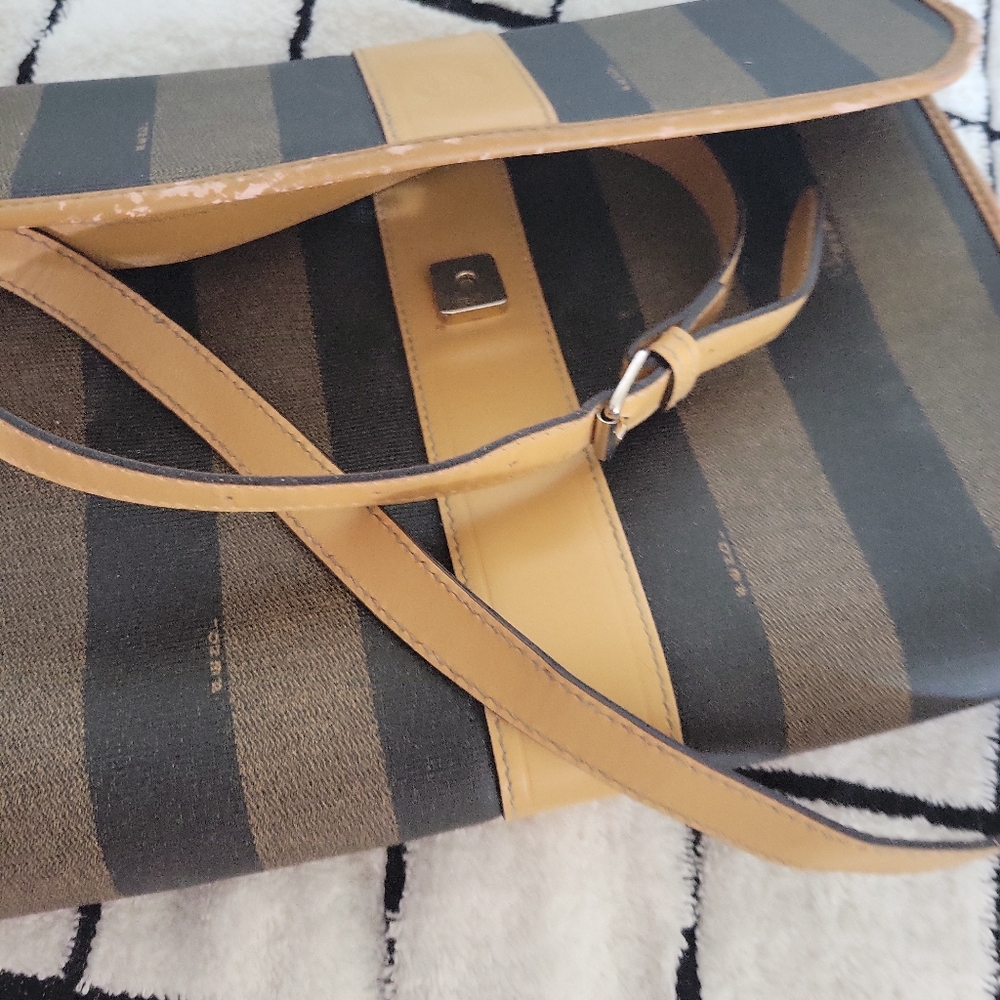 Vintage fendi With peeling around the rim